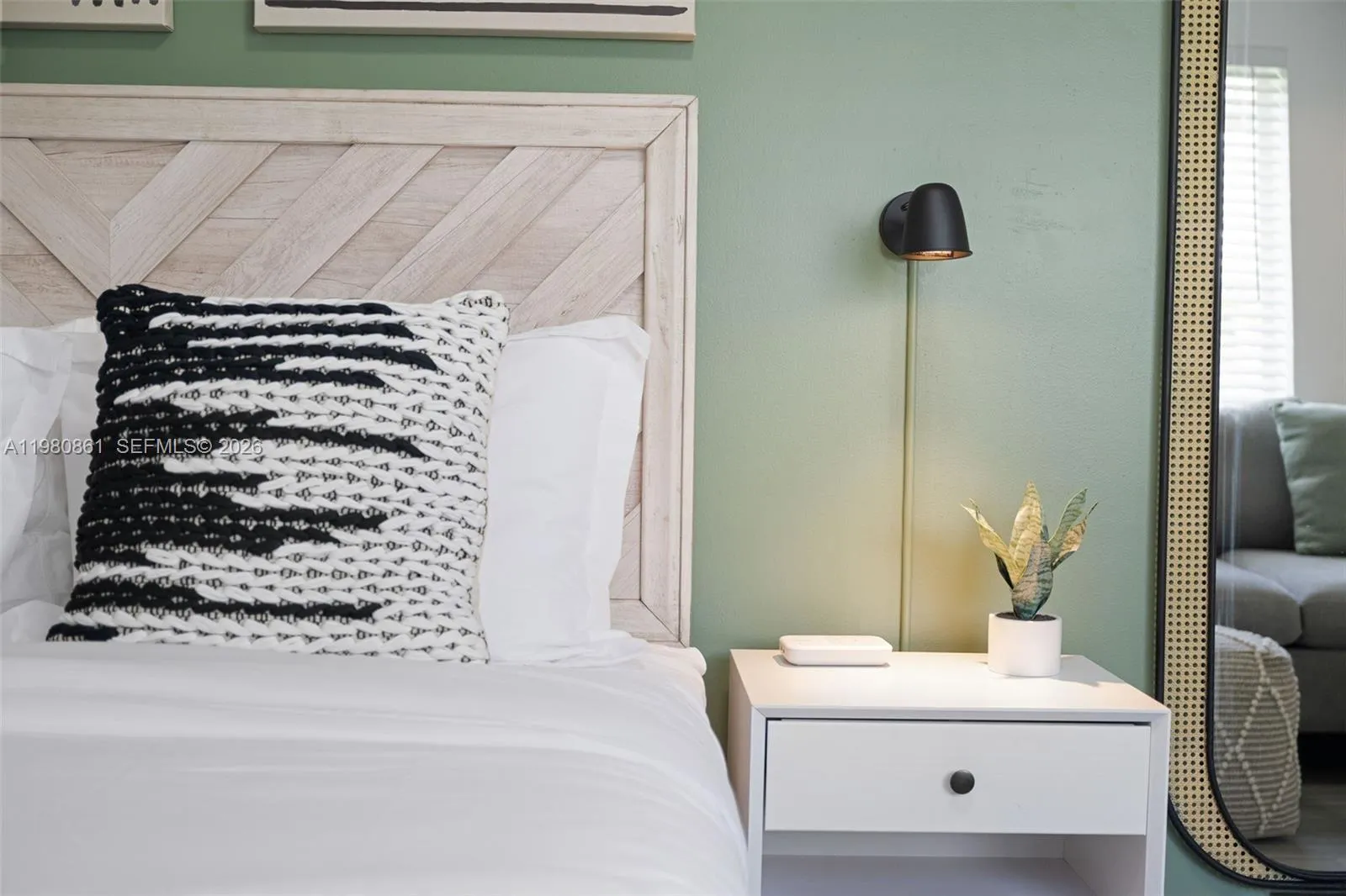 #1. Refined bedroom vignette featuring a custom wood headboard, designer accent wall, and curated modern lighting—where thoughtful details and sophisticated finishes create a serene luxury retreat