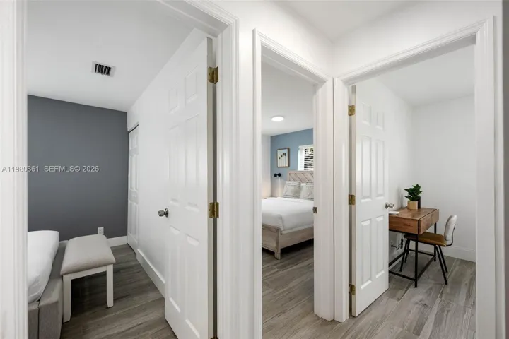 Thoughtfully designed bedroom wing offering seamless flow between private sleeping spaces and access to bedrooms 2,3,and 4, unified by refined finishes, soft natural light, and a cohesive luxury aesthetic—ideal for elevated living and versatile lifestyle needs.