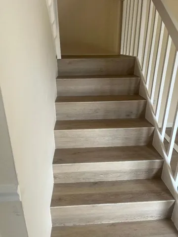Laminated floors in Stairway as well.