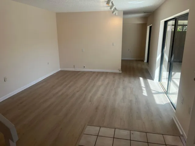 spacious Living room, Den/convertible /Bedroom, next to living room, at the end.