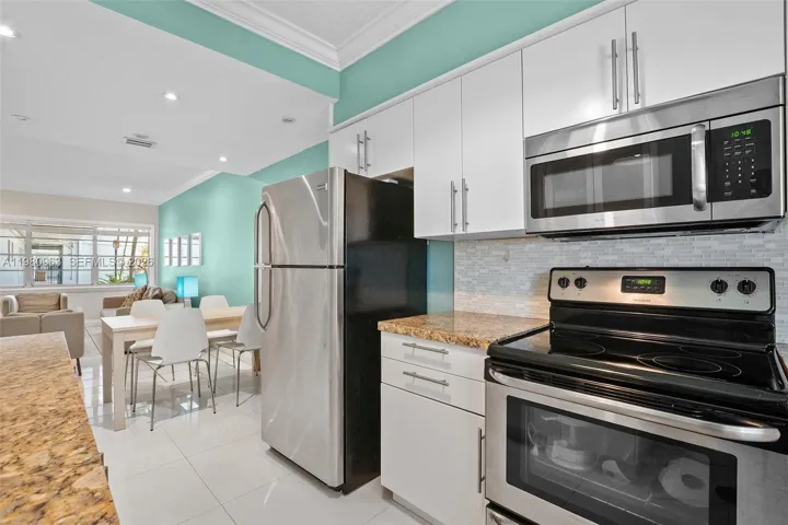 N103 Virtually Staged LIVING DINING.jpeg