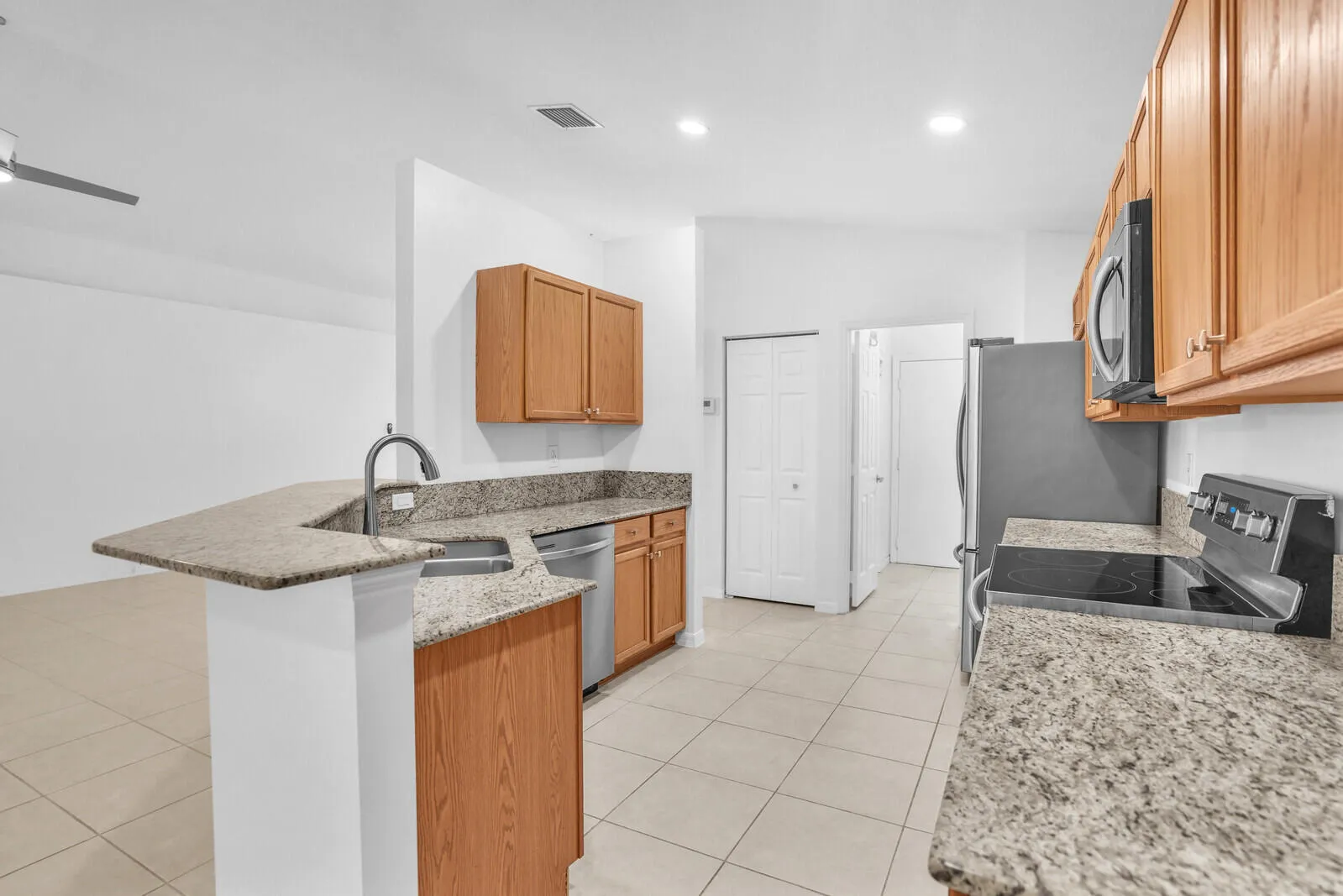 Highest Grade of Granite countertops. Newer SS appliances.