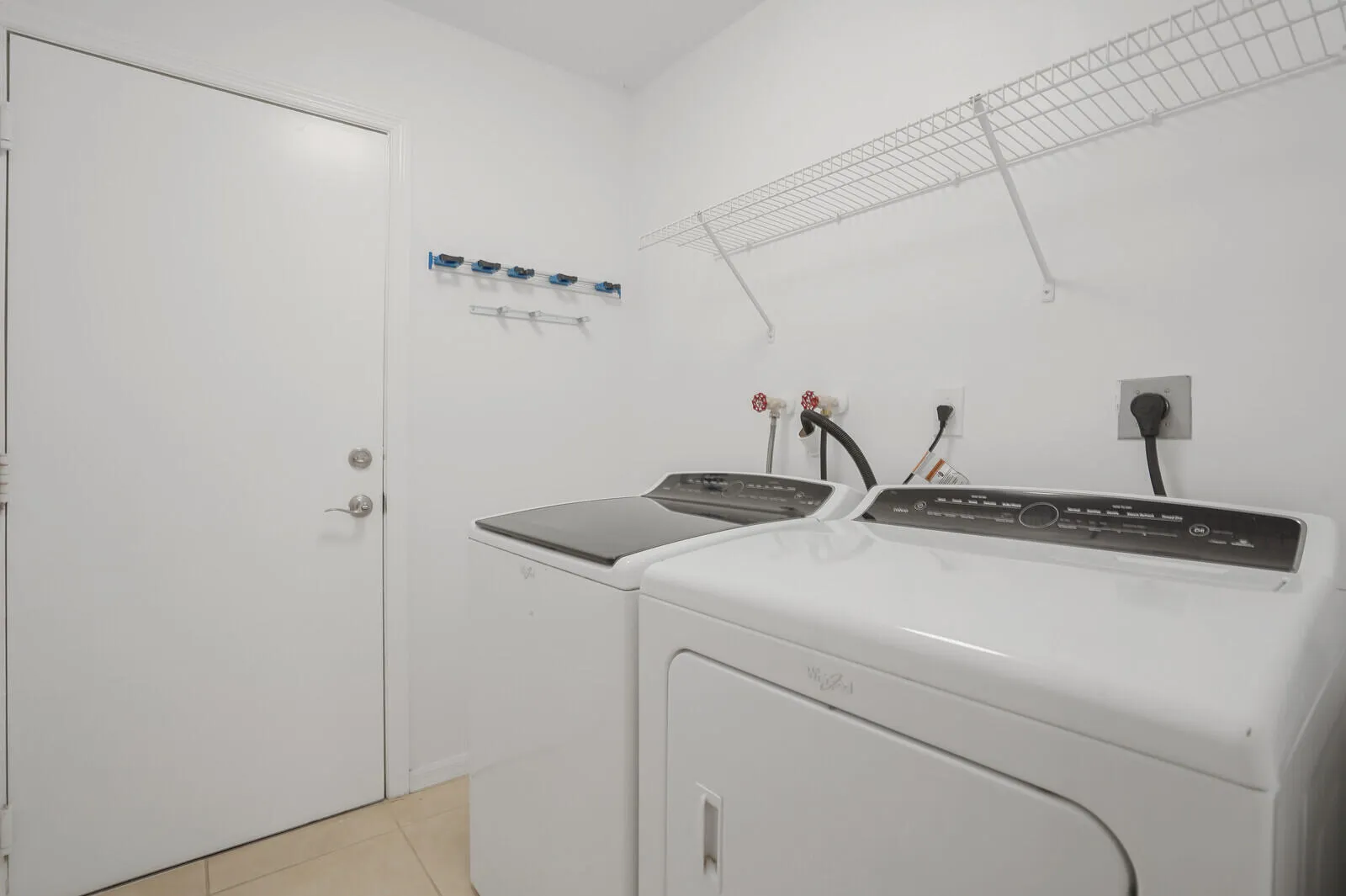 Laundry Room is private with a door off of the kitchen.