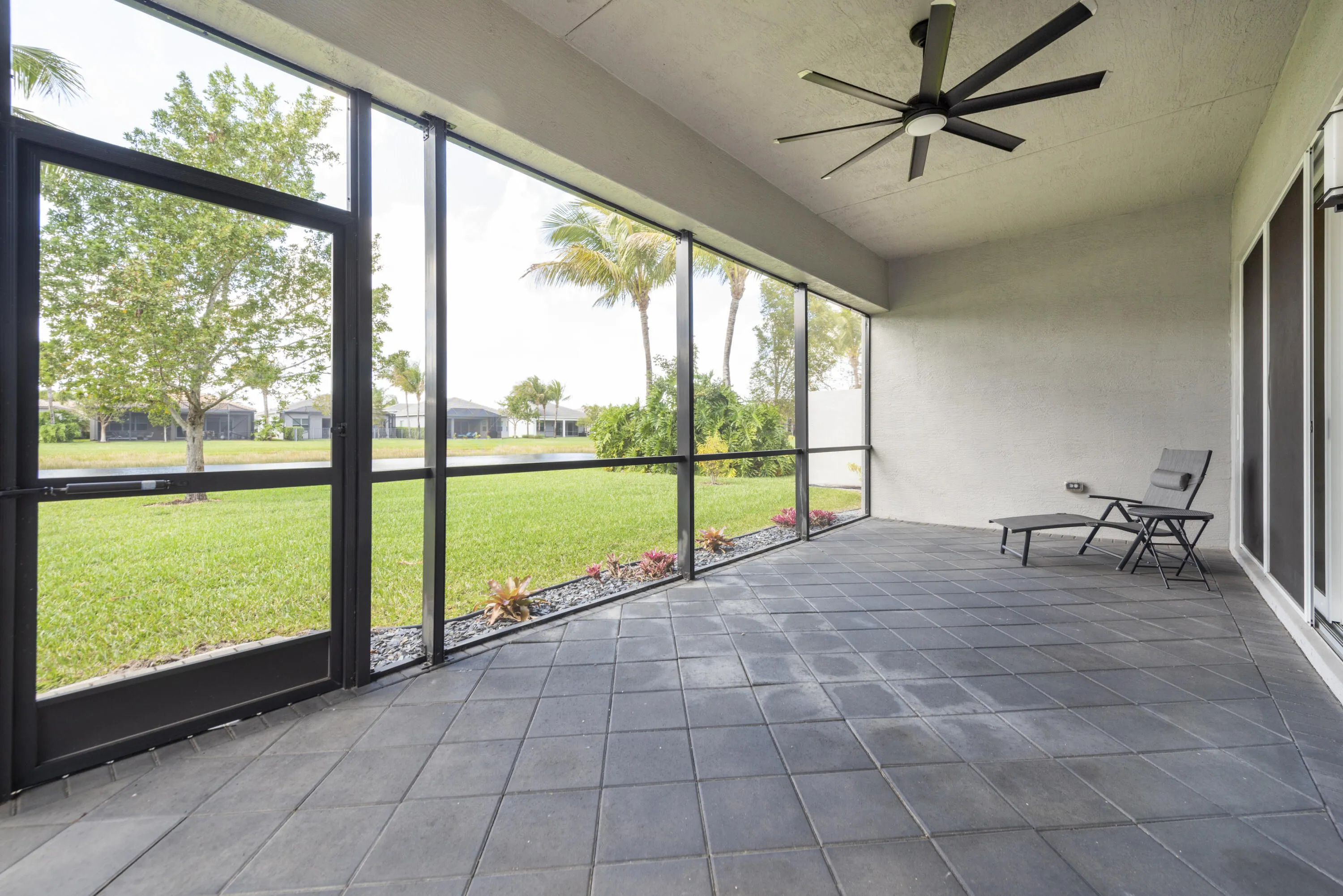 Very large paved patio ara overlooks lake view.