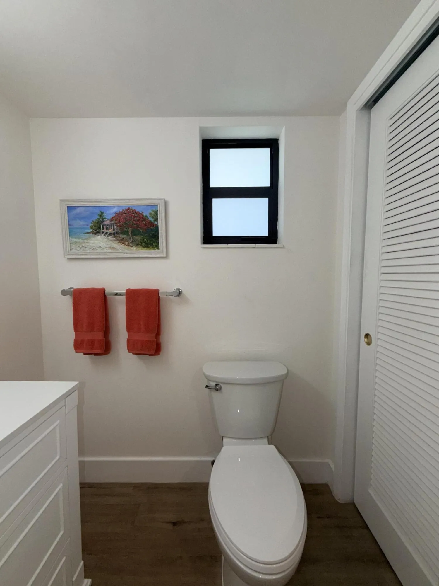 Powder room - linen closet also houses a/c and water heater