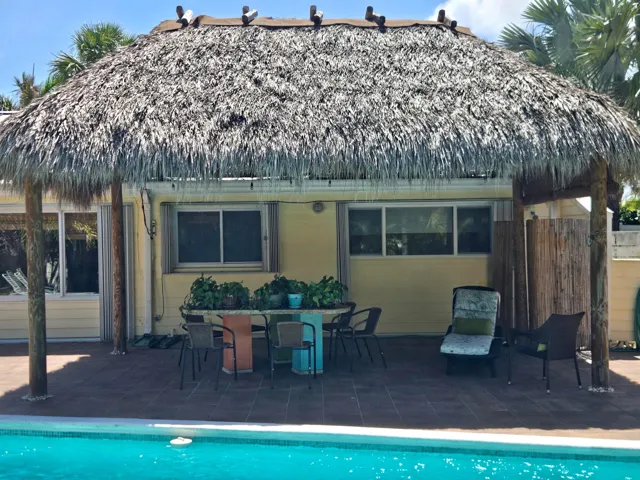Large Seminole chickee for relaxing and overlooking the large lap pool !