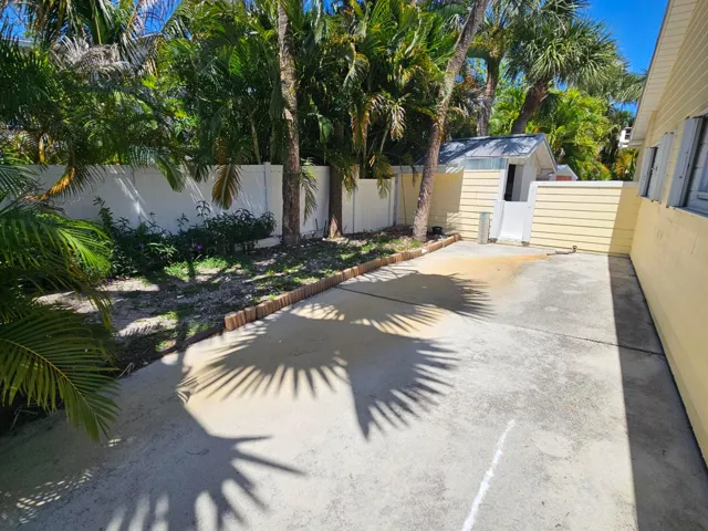 Extra driveway! Easy in and out to street!