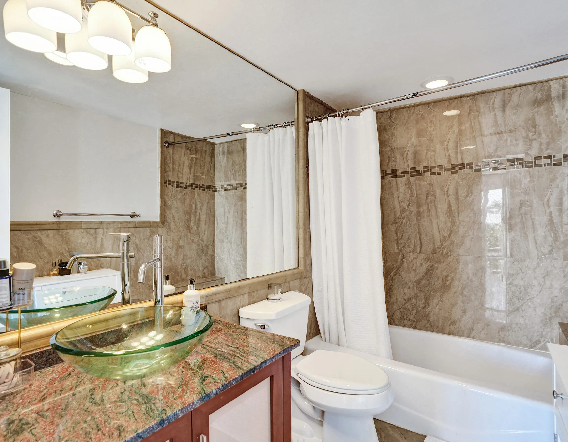Master bathroom with shower/tub combination.