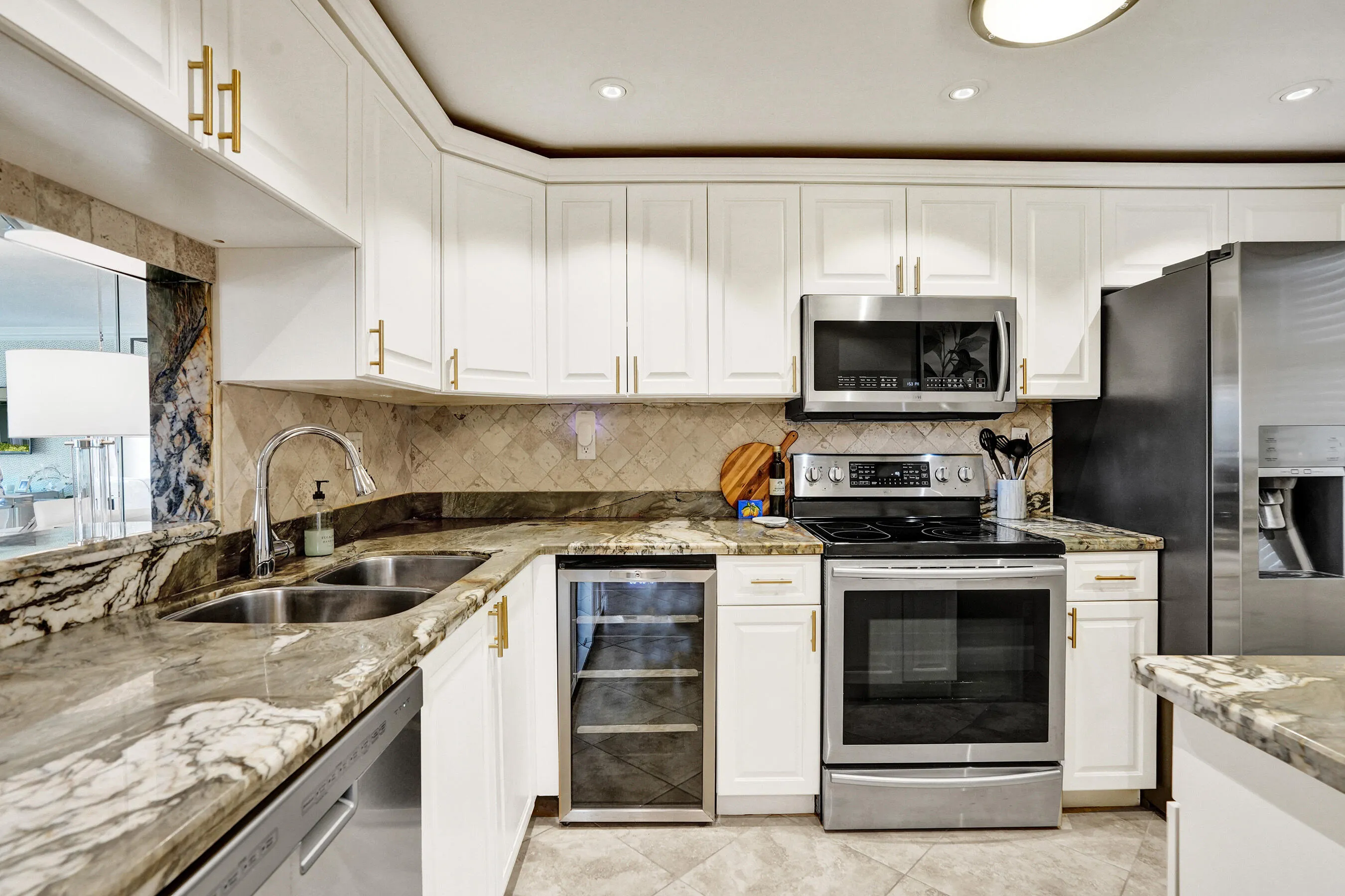 Granite countertops. Stainless Steel Appliances. Including a wine fridge.