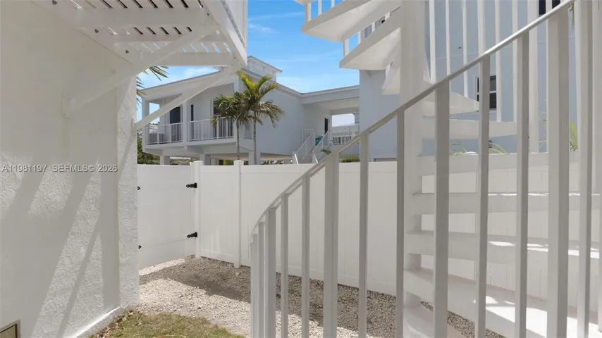 Exterior Spiral Stairs to First Floor Balcony