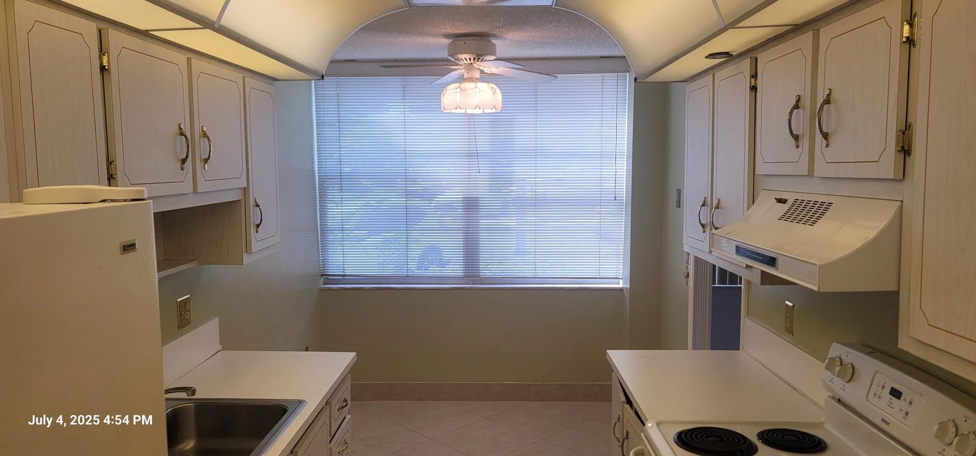 Eat-in Galley Kitchen with Garden View