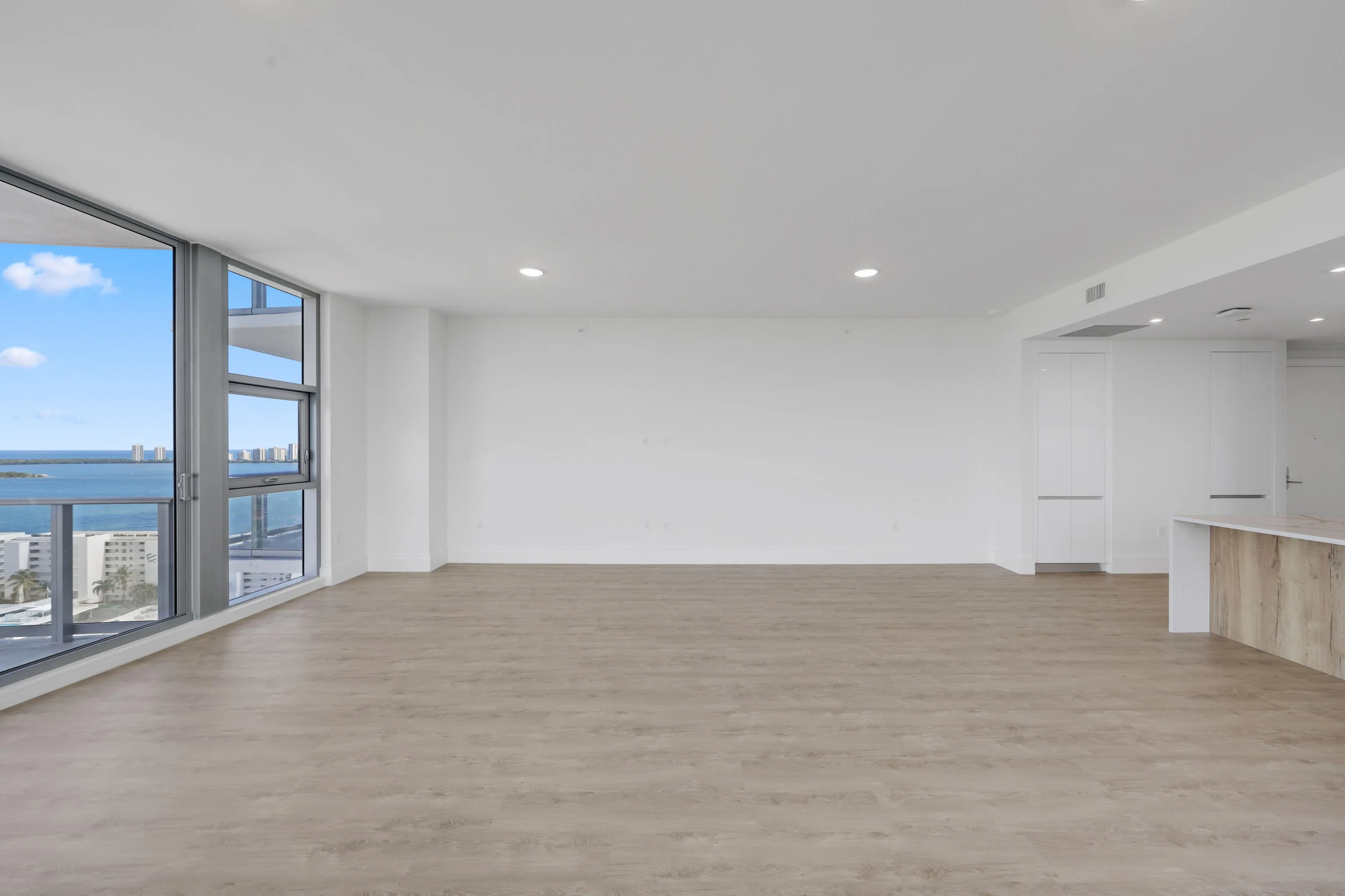 great room facing east with distinct water views