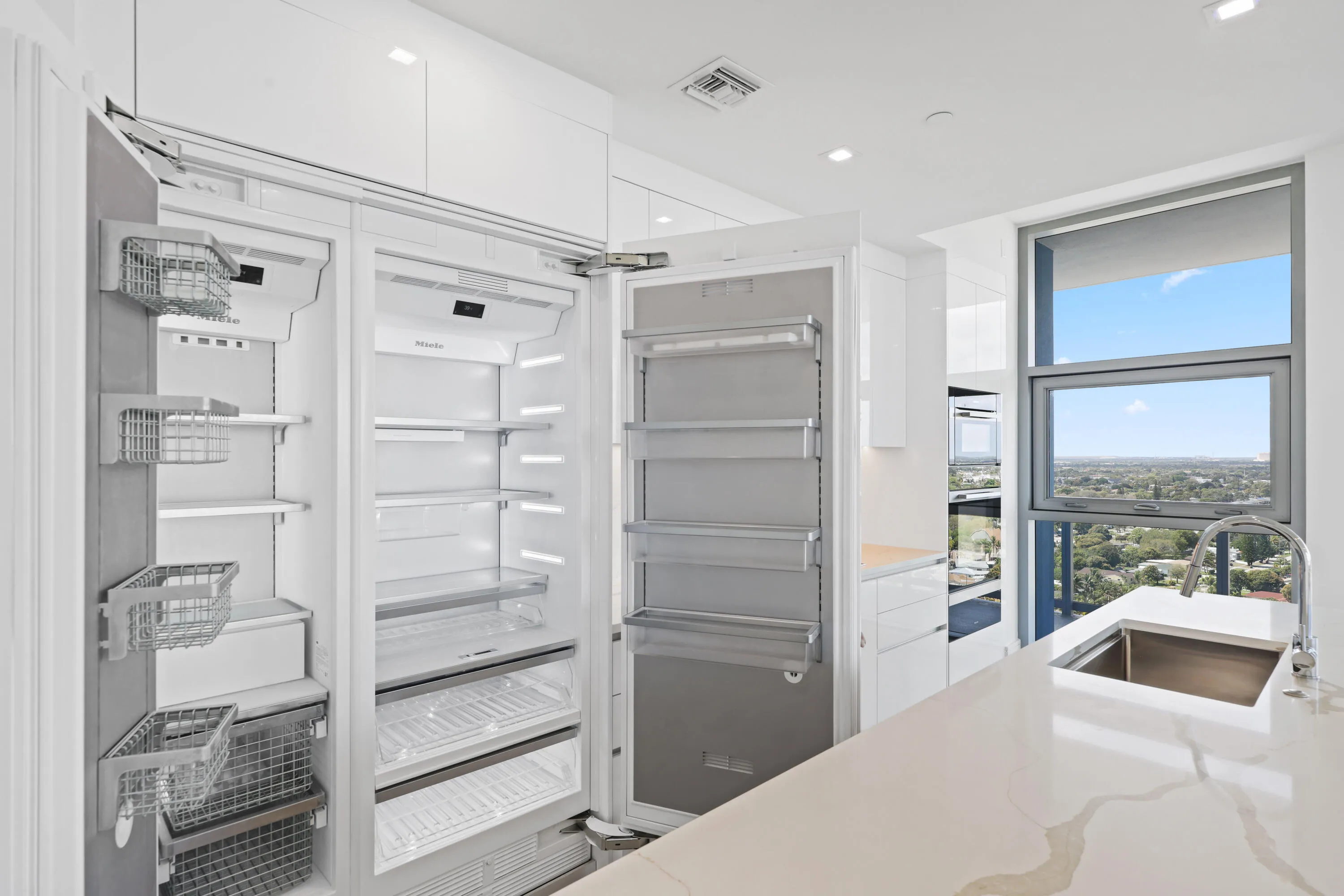 open refrigerator and freezer view