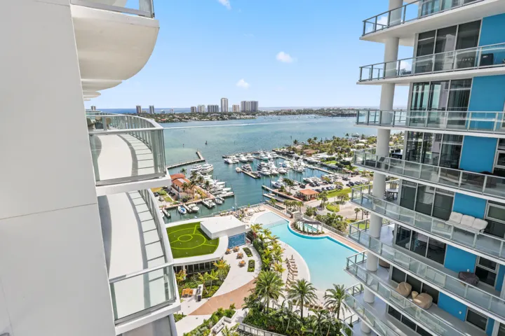 primary suite terrace south-east view overlooking 6th level pool area, marina and intracoastal