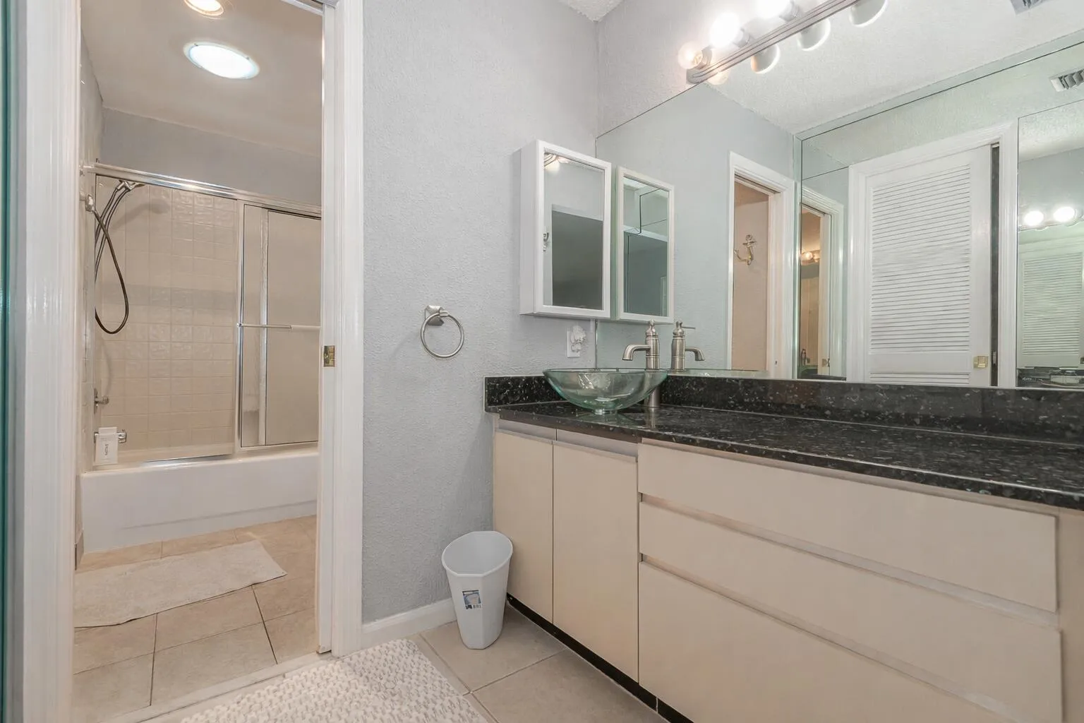 Modern bathroom with bath and shower