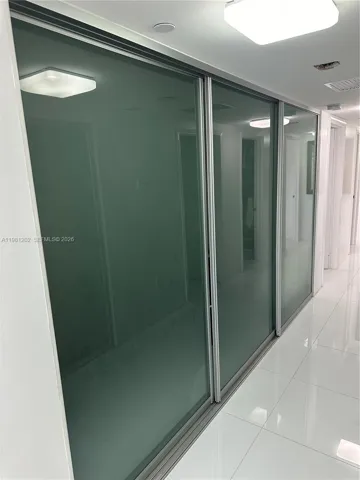 media room with sliding doors