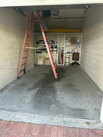 private garage with storage. Has electric garage door. There also a second reserved space in main parking area