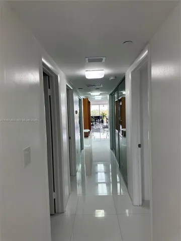 hallway towards kitchen and living room