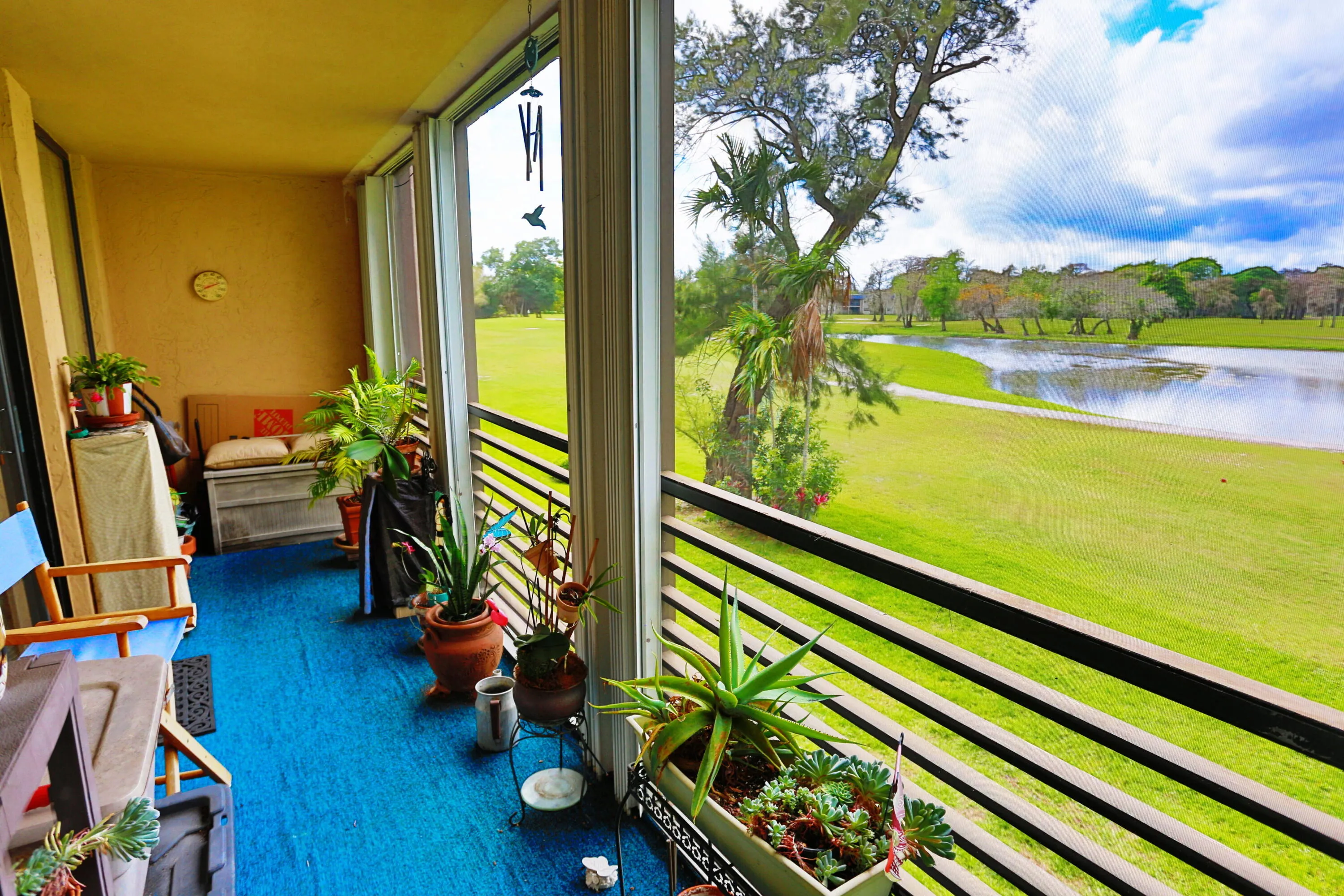 screened balcony overlooking golf course