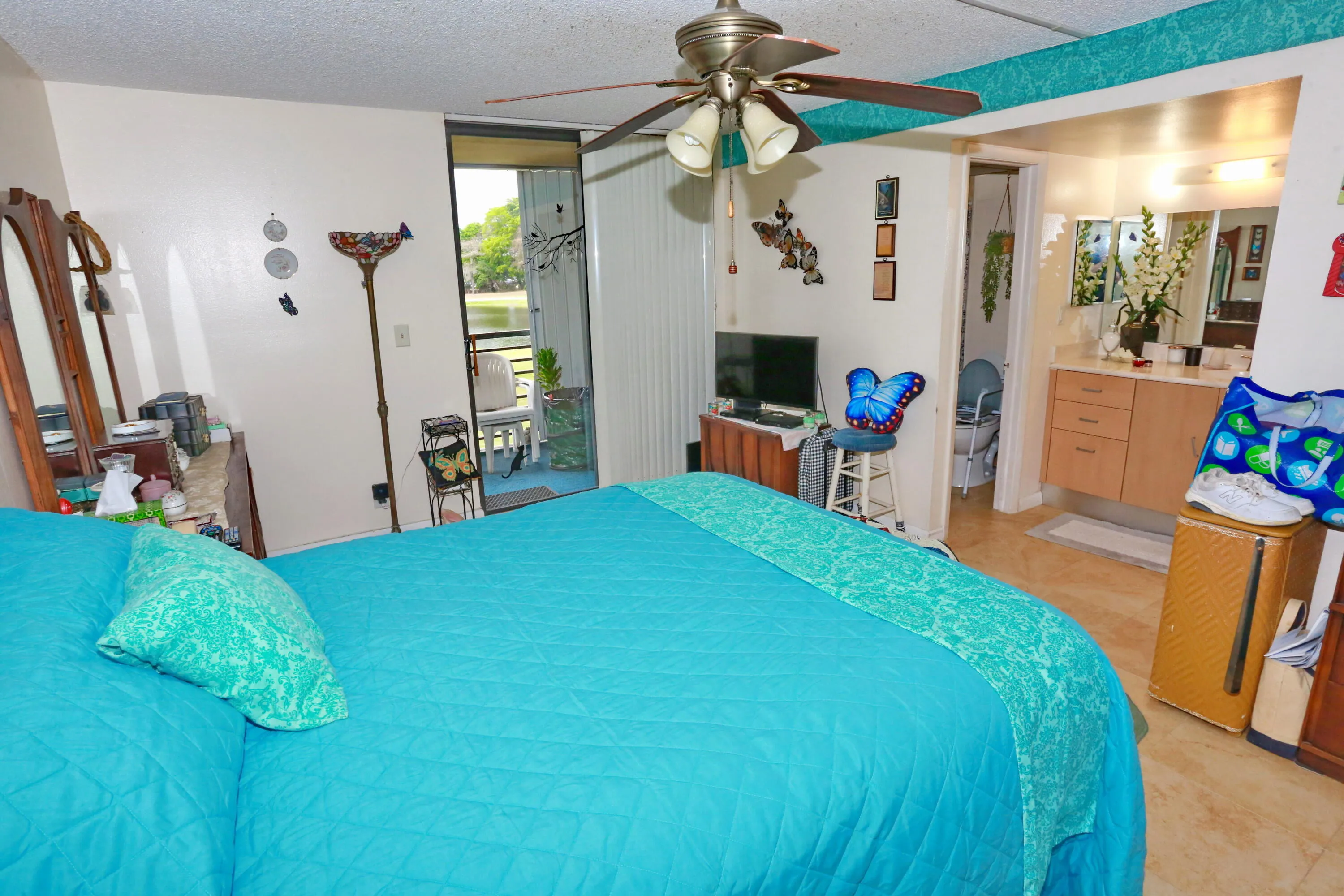 master suite with private balcony sliding door