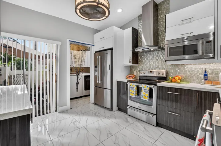 Entertaining is a breeze in your sensational kitchen with NEW Maytag stainless steel appliances.