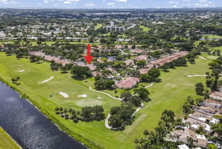 Manicured golf view and wide canal view to Boca.