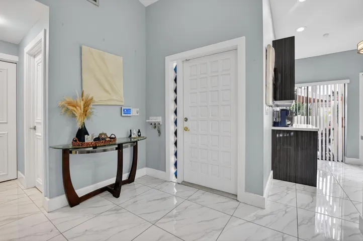 Foyer entry into wide-open living areas with 1,800+ SF.