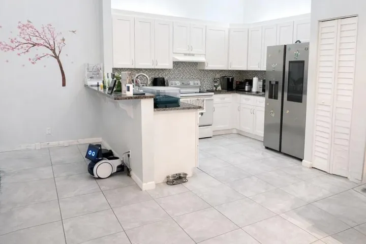 Spacious modern home office and kitchen