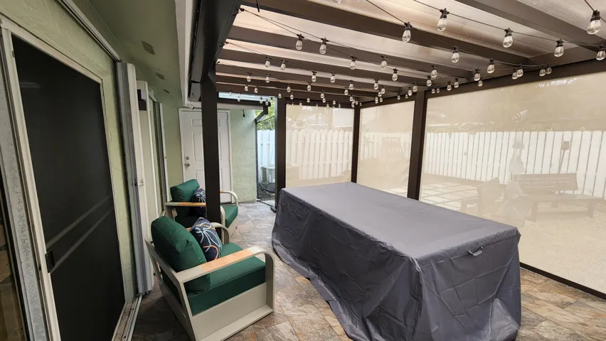 Covered Pergola with Screens Down