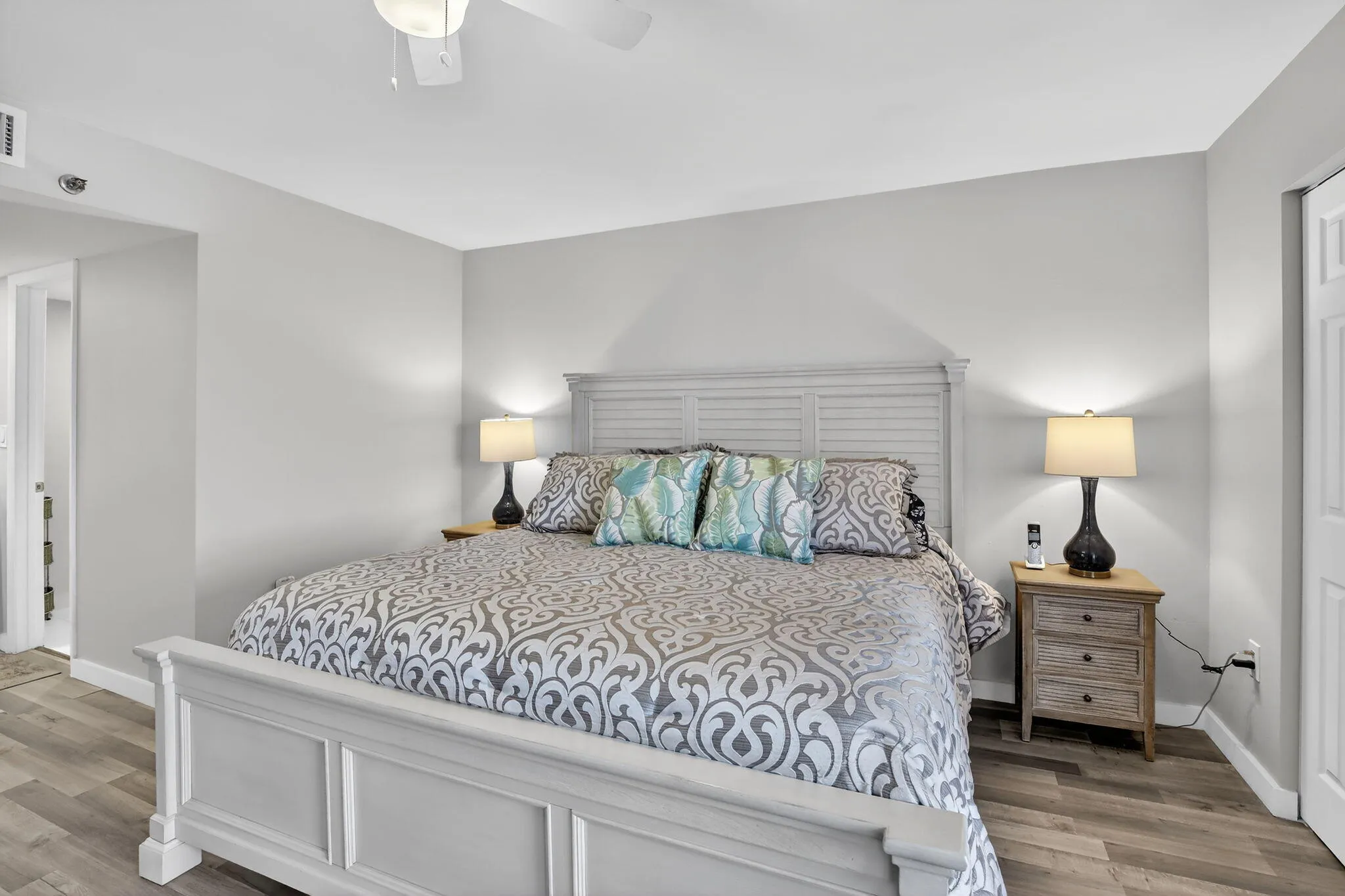 Expansive, primary bedroom fits a large king-sized bed, and features 2 walk-in closets!