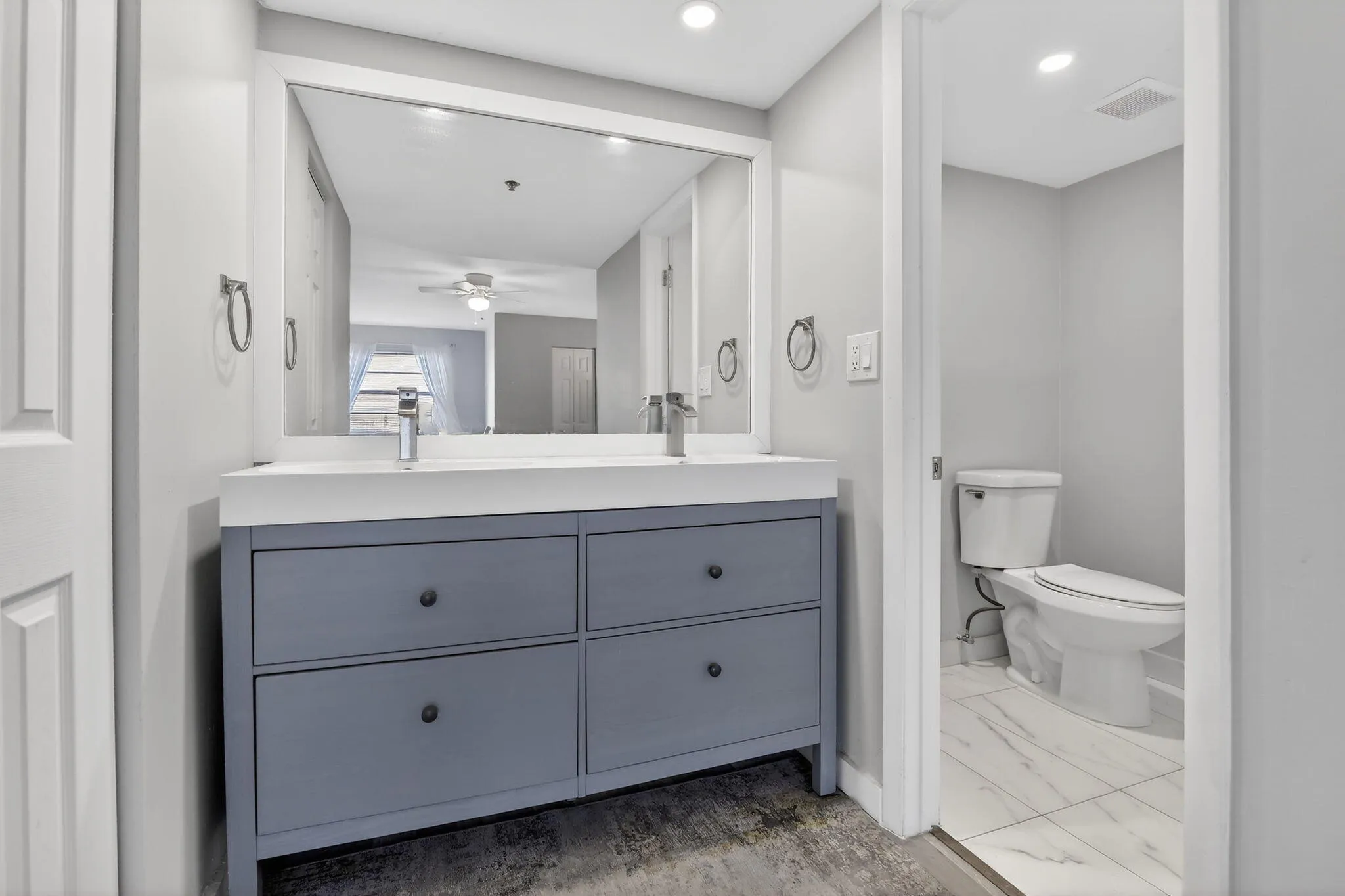 Primary bathroom features dual sinks, separate water closet and standing shower!