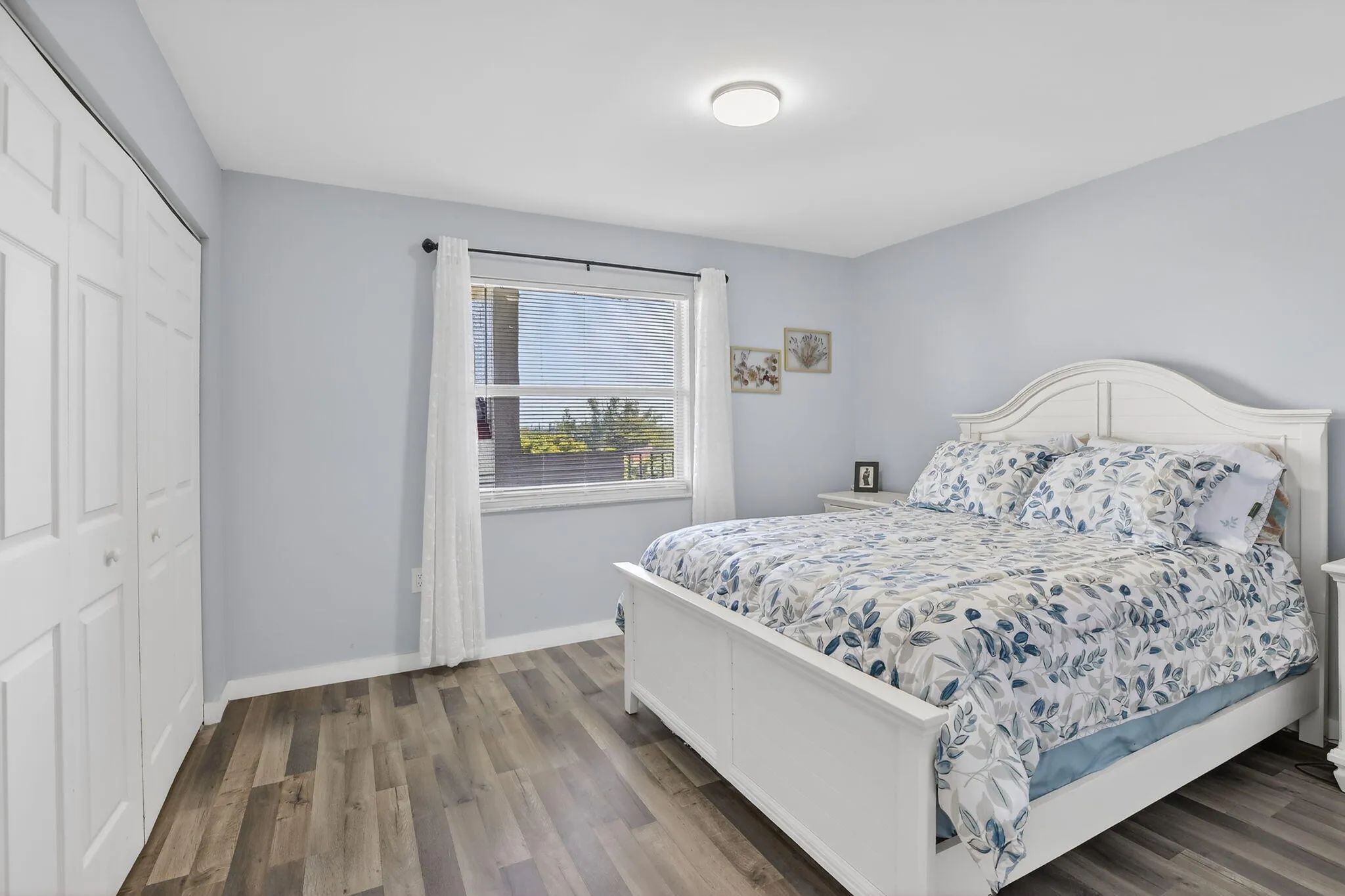 The guest bedroom is a perfect space for family and friends to stay! Deep, closet has plenty of room for extra storage!