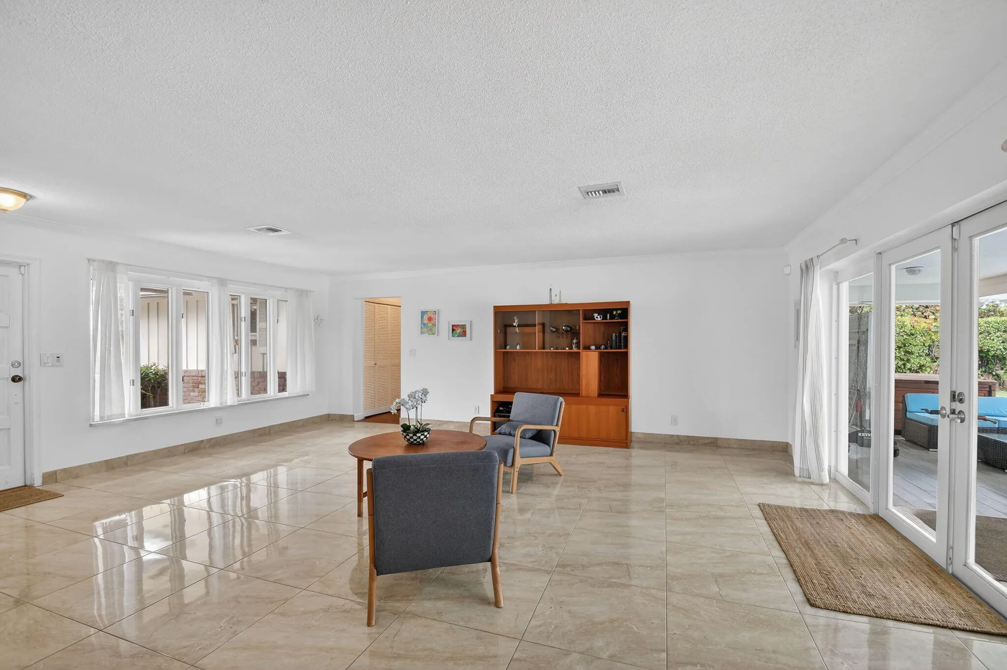 Expansive main living area with open floor plan suitable for entertaining and everyday living.