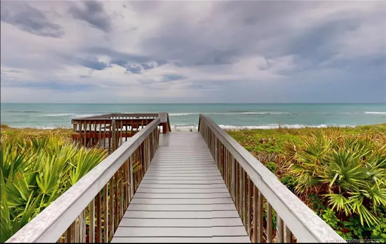 Can you imagine this walk-over right in front of your condo? Sunbath, shell search, fishing, surfing and soooo much more.