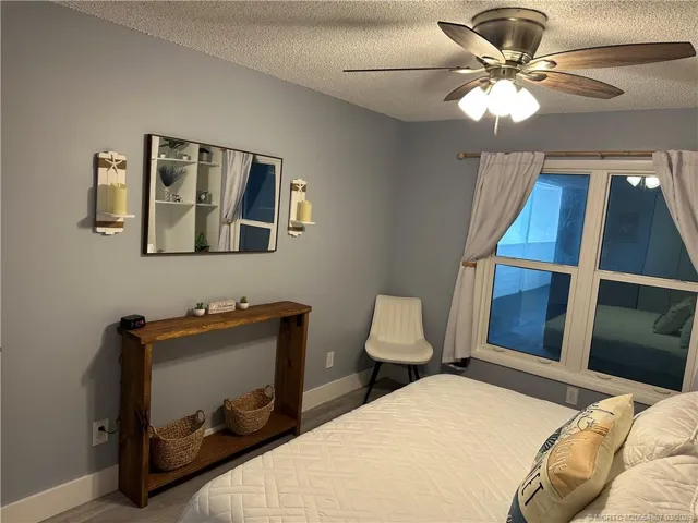 Spacious bedroom with ample closet space.