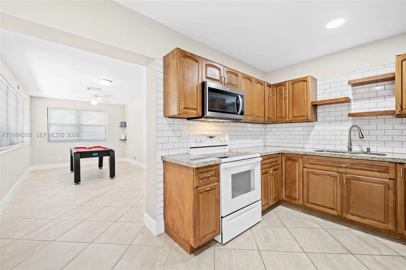 Kitchen with view to additional family room