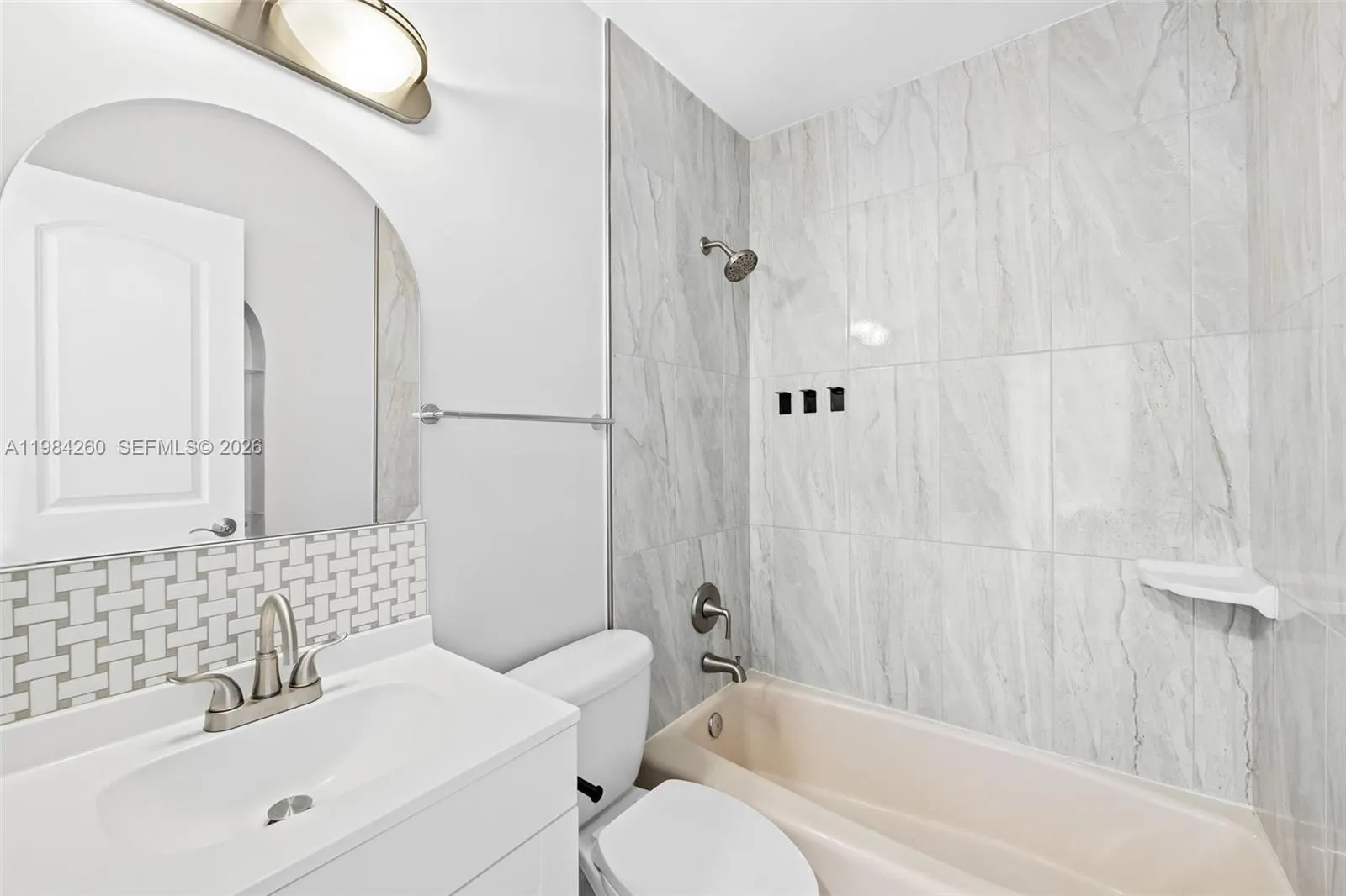 Guest Bath featuring shower / tub combo