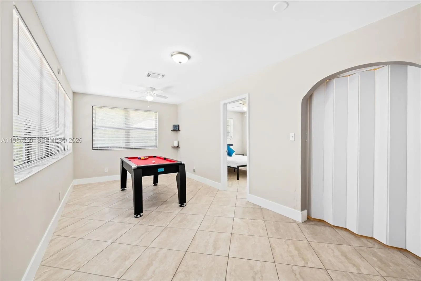 Family room. Behind closet doors on right is full washer / dryer