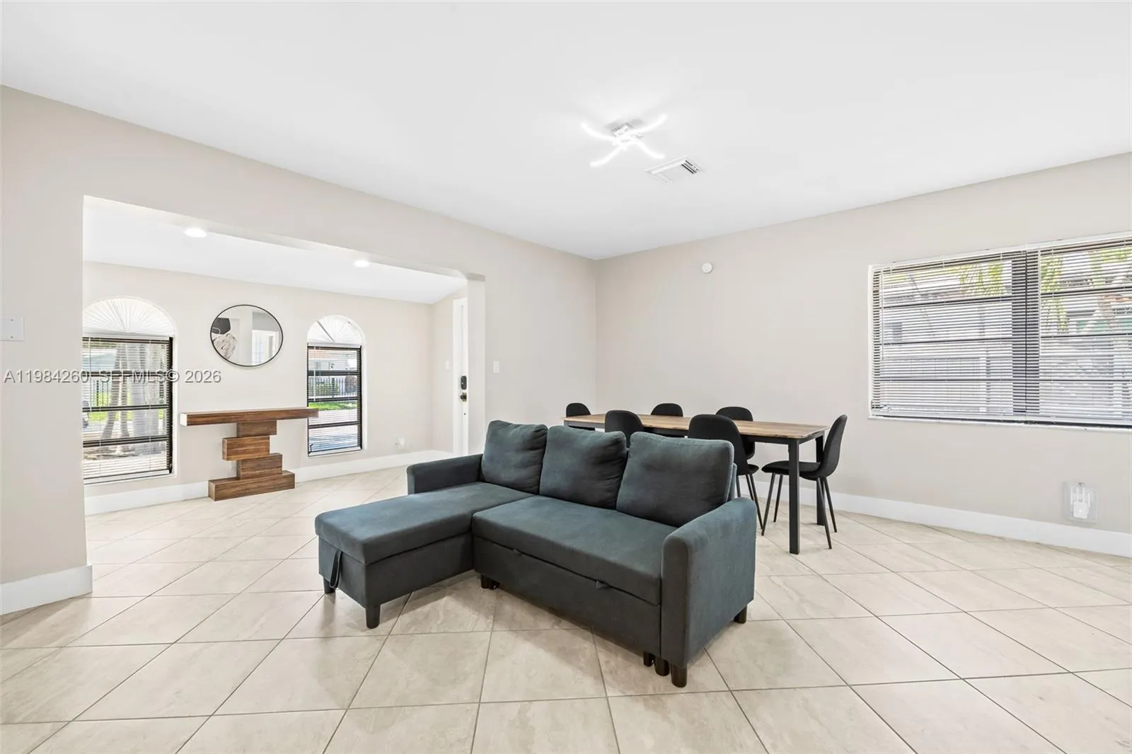 Living / dining room with view to foyer