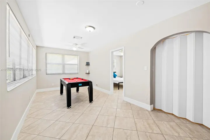 Family room. Behind closet doors on right is full washer / dryer