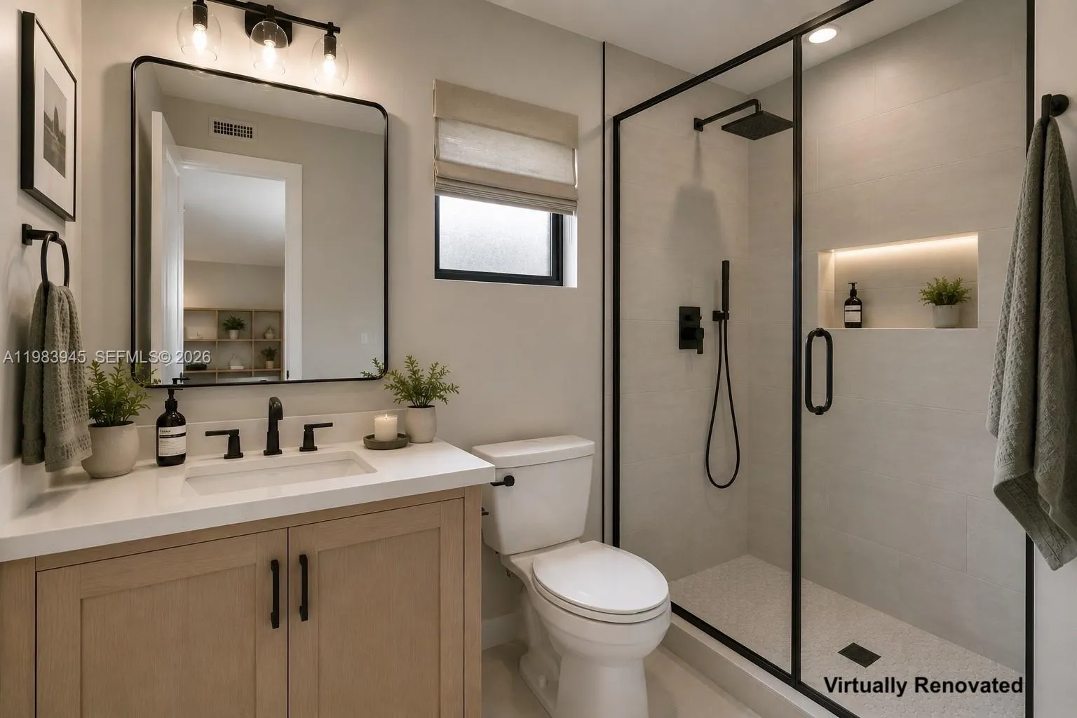 Second bathroom. Image virtually renovated & staged to help buyers visualize possible updates.