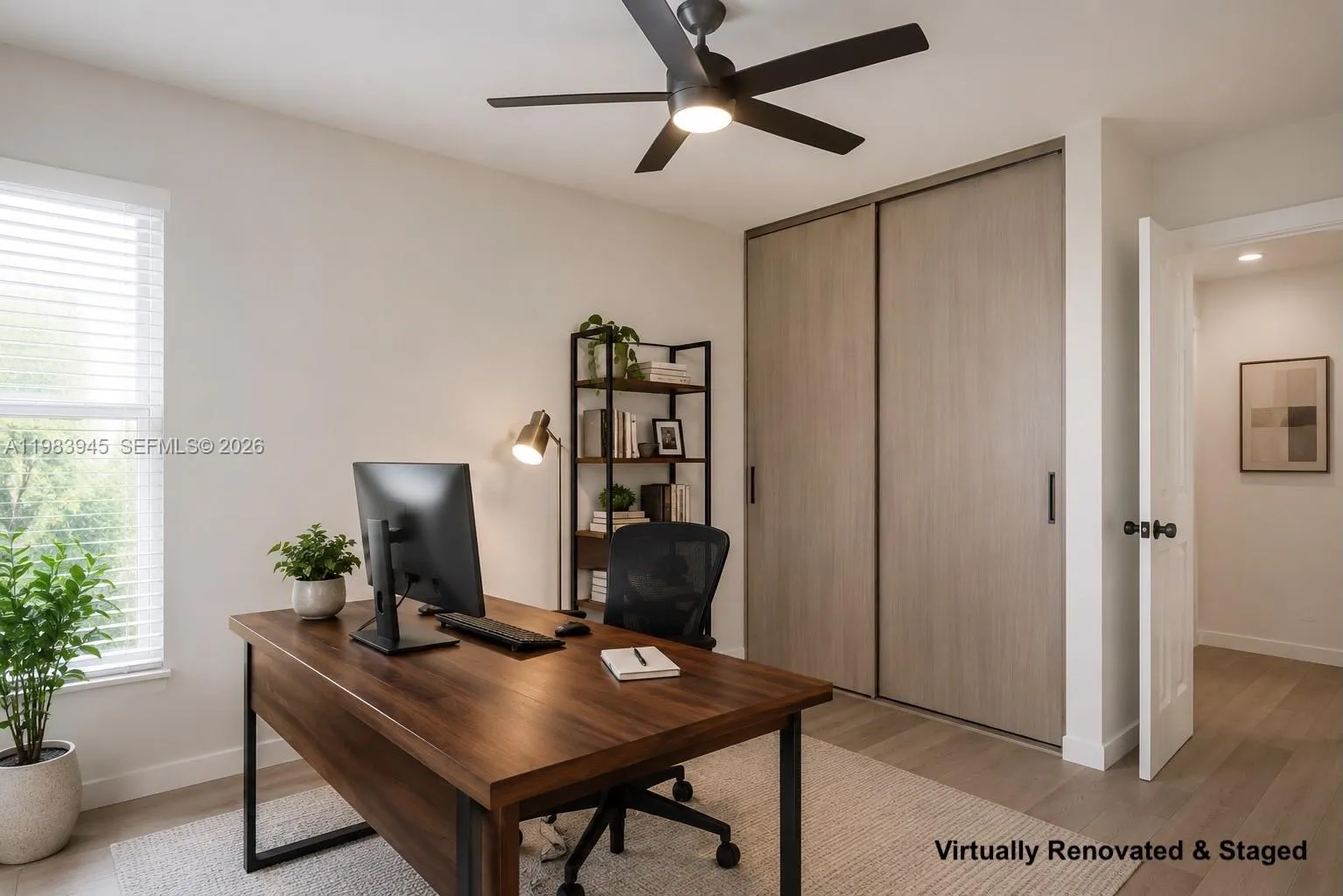 2nd Bedroom/ Guest room/Office. Image virtually renovated & staged to help buyers visualize possible updates.