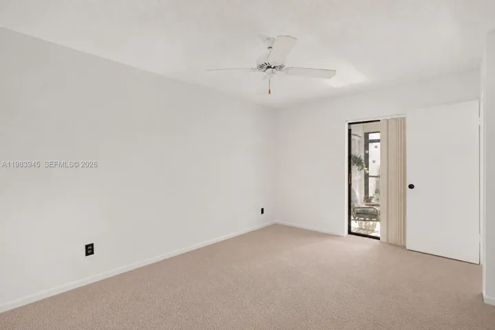 Primary Bedroom. Owners furniture digitally removed from photos