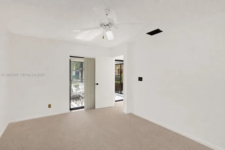 Primary Bedroom. Owners furniture digitally removed from photos