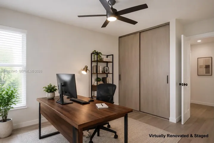 2nd Bedroom/ Guest room/Office. Image virtually renovated & staged to help buyers visualize possible updates.