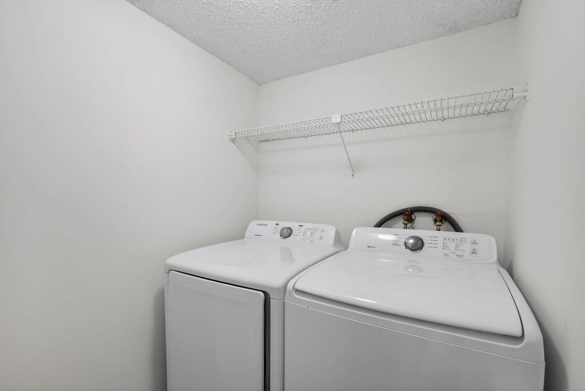 Laundry room inside unit