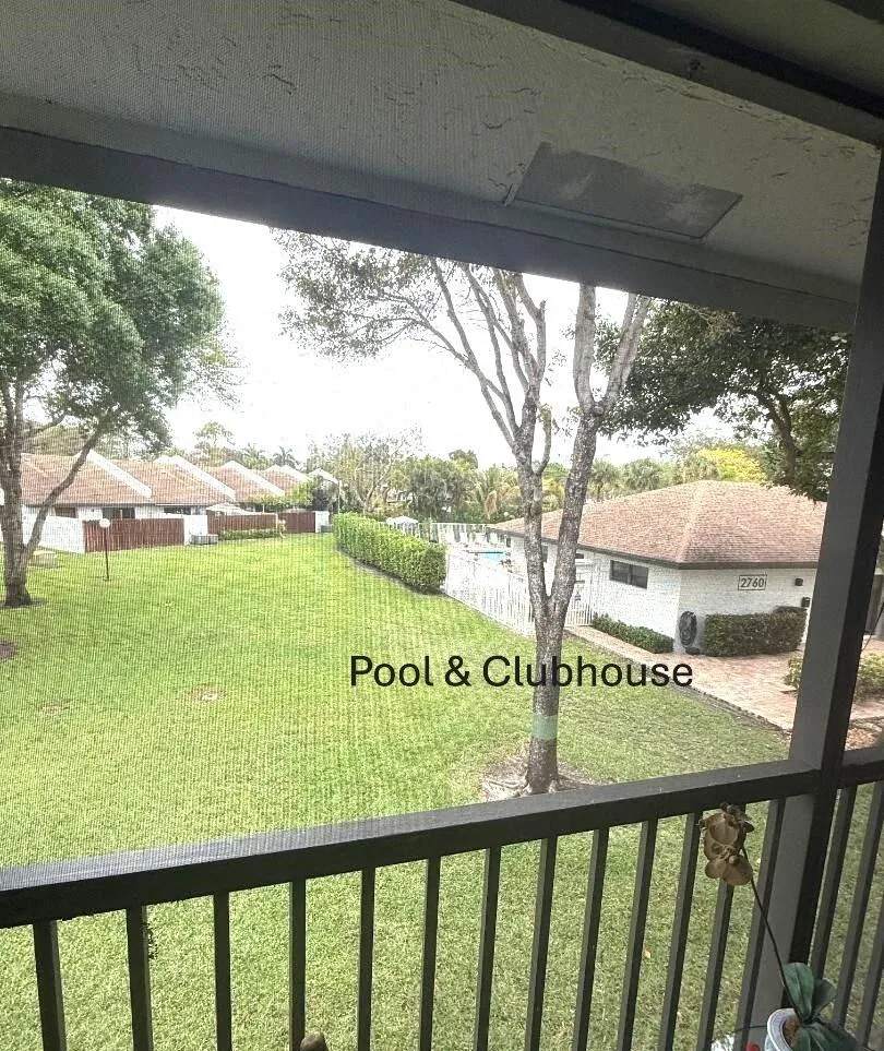 patio with pool-clubhouse view