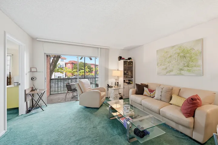Lge. Living Room, w/ Balcony .