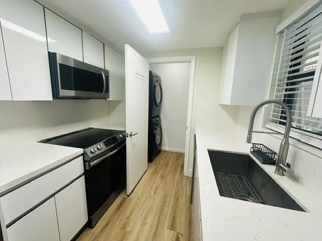 A MUST see unit that will not last! Experience coastal living in this 1-bedroom,1-bathroom condo nestled on the picturesque Intracoastal Waterway community for yourself or as an investor! pet friendly. This condo can be rented right away twice per year. The updated kitchen features stainless steel appliances, Corian countertops as well as an updated bathroom! Large walk-in closet. Sliders and master bedroom open up to a covered patio. There is a locker on the floor for extra storage, and other amenities including a clubhouse, swimming pool, sauna, and tennis courts, local beaches are just minutes away, Hidden Harbour is a gated community and also close to a marina, shops, and restaurants. The unit is unfurnished.