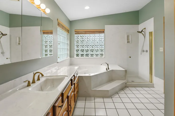 Soaking tub with separate shower